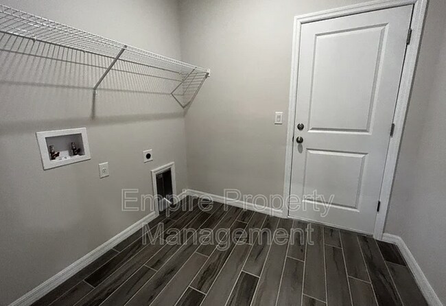 Building Photo - 4 Bedroom 2 bathroom 3 Car Garage NE Cape ...