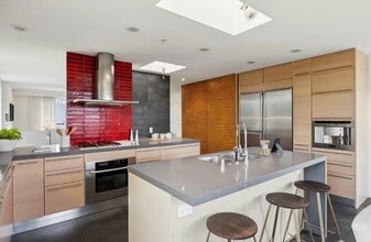 Building Photo - One-of-a-Kind Sophisticated Top-Floor Cond...