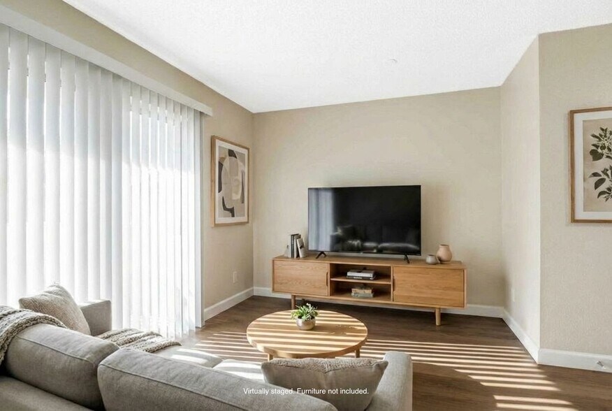 2 BR, 1.5BA Townhouse Living Room (staged) - Mission Village Apartments