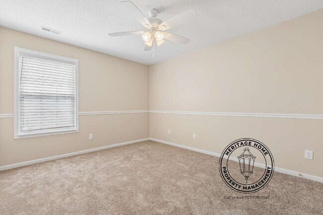 Building Photo - "Charming 4-Bedroom Retreat with Fireplace & Hardwood Floors on Michelle Drive!"