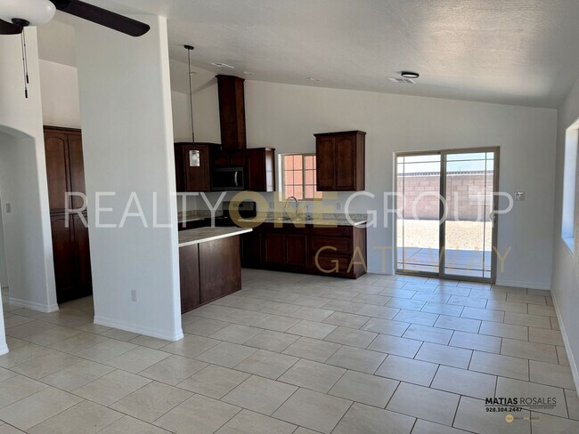 Building Photo - Three Bedroom Two Bath Home with All Tile ...