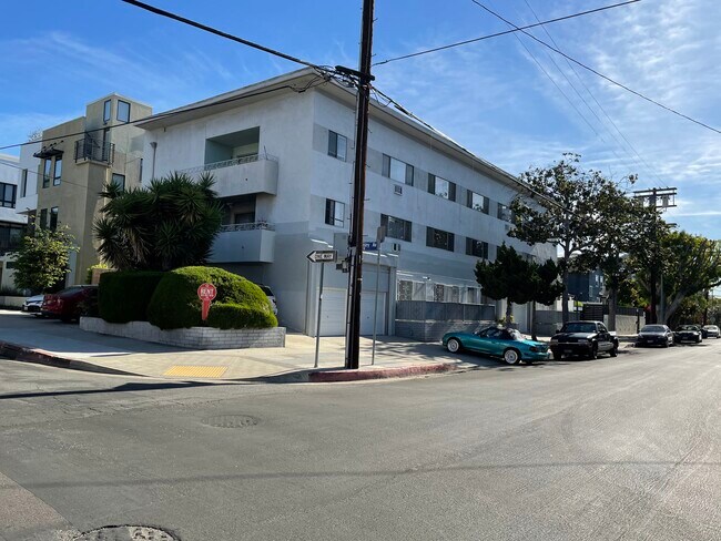 Newer garage doors. - 7617 De Longpre Ave