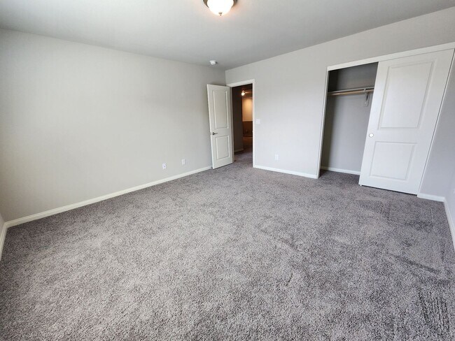 Building Photo - A Fairly New Home with 5 Bedrooms in a gated community