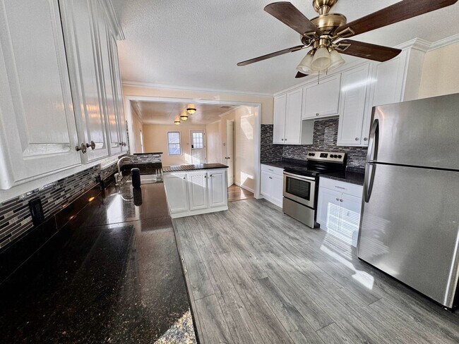 Building Photo - Move-In Ready 4BR Home with Finished Basement, Flex Space & Large Yard