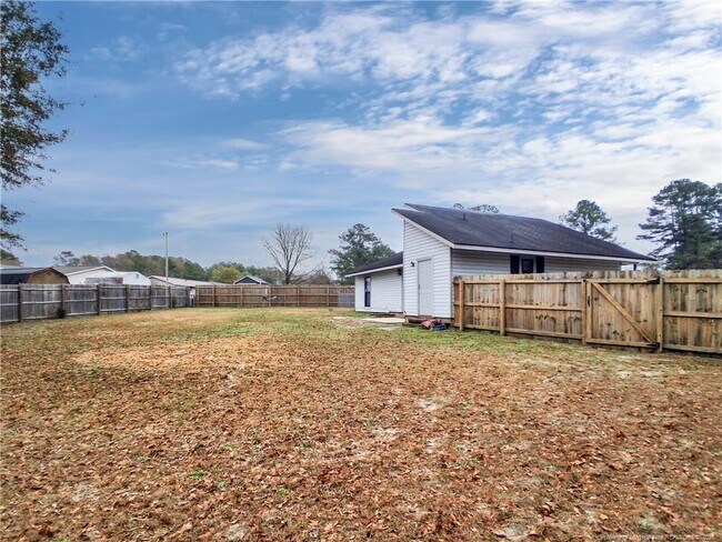 Building Photo - 6594 Honeysuckle Dr