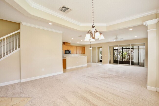 Building Photo - Stylish and Spacious 3/2.5 Townhome with Premium Features and Community Pools