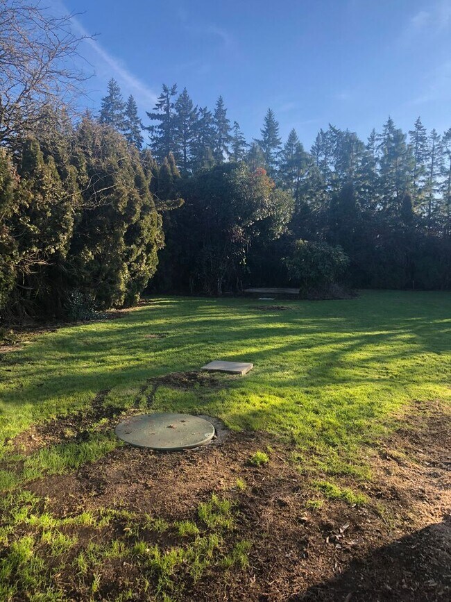 Building Photo - Surrounded by Nature, Close to Town!