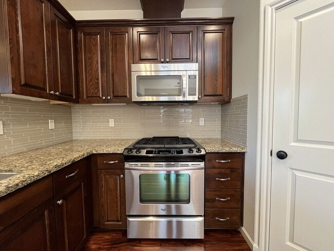 Building Photo - 3BD/3BA Bethany Home with Vaulted Ceilings, Stainless Appliances & Gas Fireplace