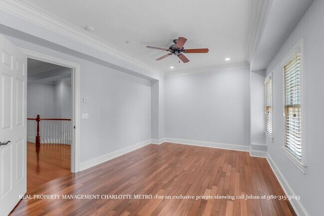 Building Photo - Luxurious 4 Bedroom, 5.5 Bathroom Townhome on Prestigious Queens Road. Contact (980) 315-3645 for...