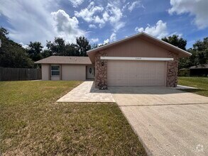 Building Photo - Fully Renovated Palm Harbor Home