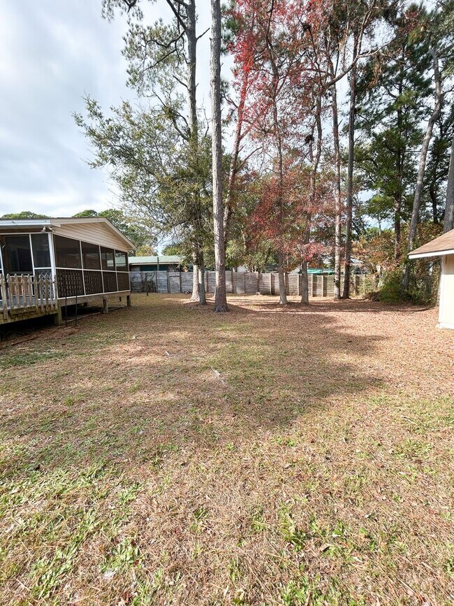Building Photo - Charming 2 Bedroom Home in Southport with Screened Porch & Large Fenced Backyard