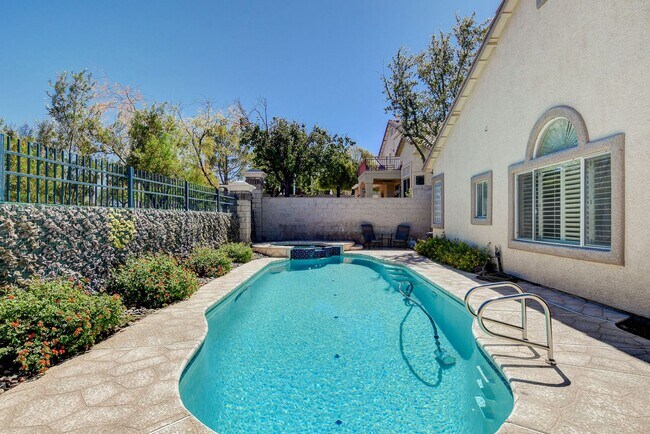 Building Photo - QUALITY FULLY FURNISHED SEVEN HILLS HOME WITH A PRIVATE POOL AND SPA