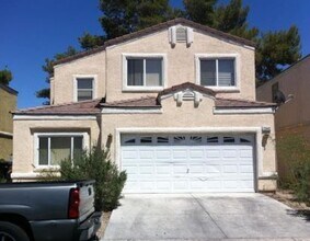 Building Photo - Spacious 4 Bedroom Home in a Gated Community with Attached 2-Car Garage