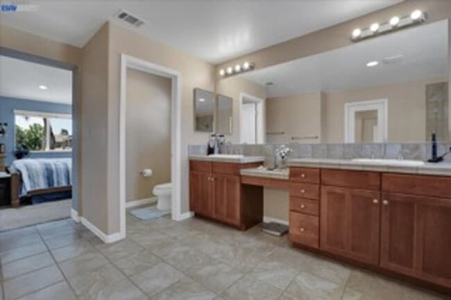 Building Photo - COMING SOON!! Spacious 4-Bedroom Home in O...