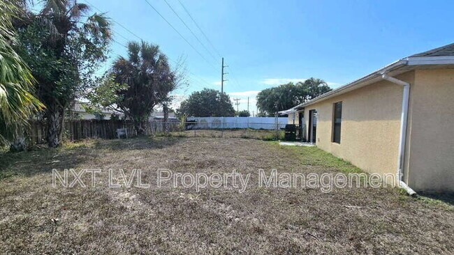 Building Photo - 303 NE 24th Ave