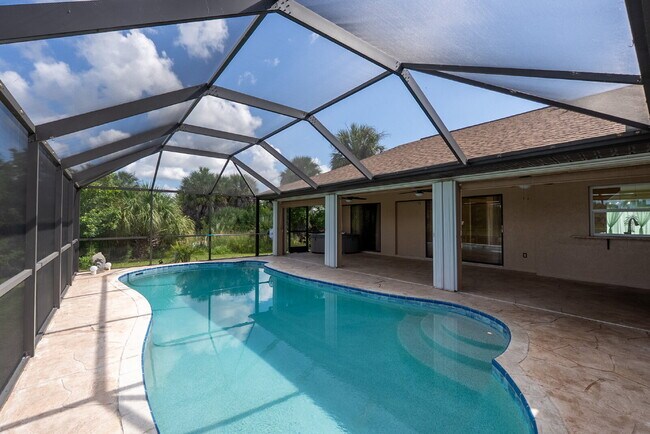 Building Photo - 3 BEDROOM • 2 BATHROOM • PRIVATE POOL • WATERFRONT • BOAT LIFT • ZERO DEPOSIT MOVE-IN AVAILABLE