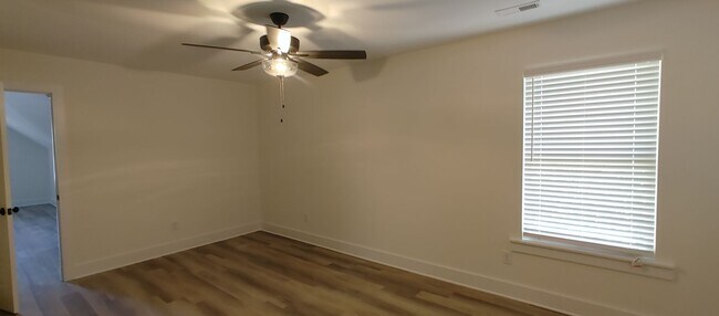 Building Photo - 5-bedroom home with 3 car garage and fully...