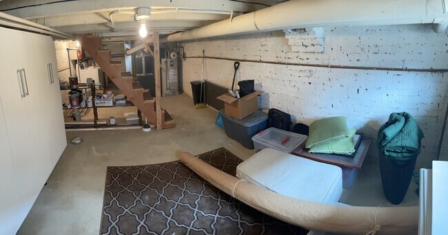 basement: washer, dryer, and lots of storage - 1406 Haubert St