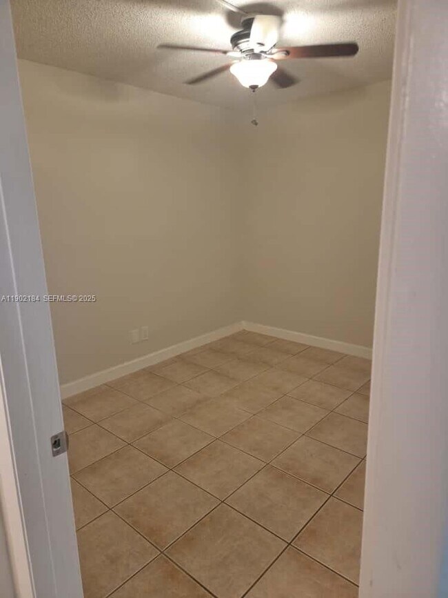 Building Photo - 7406 Woodmont Terrace