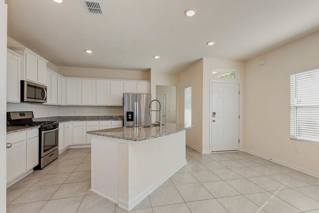 Building Photo - Silver Leaf townhouse w/ Office!
