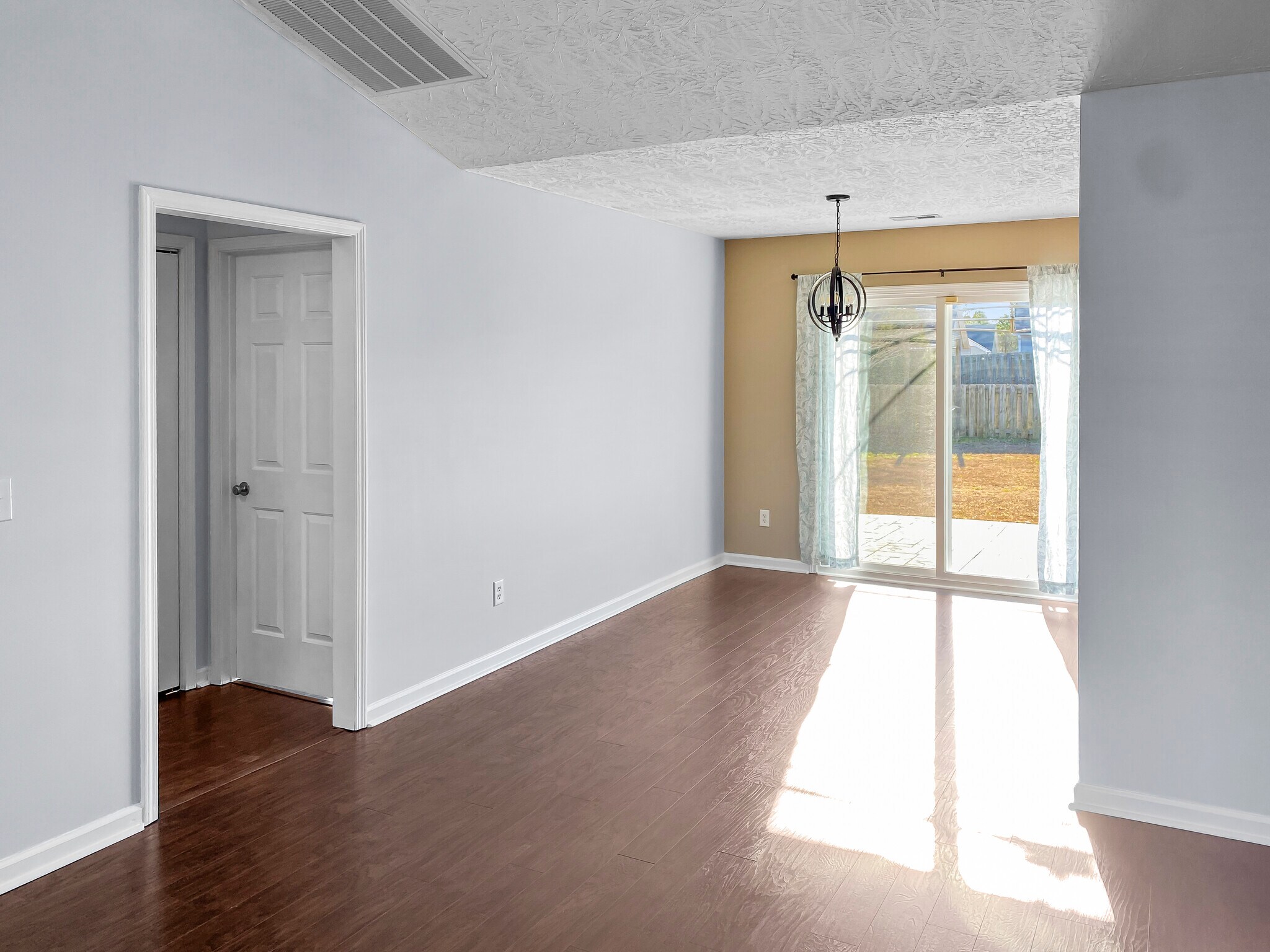Living Room to Dining Room - 213 Red Carnation Dr