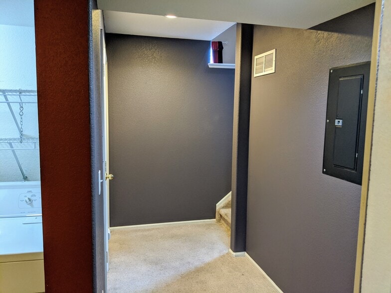 Basement Hallway to Stairs - 6803 Autumn Ridge Dr