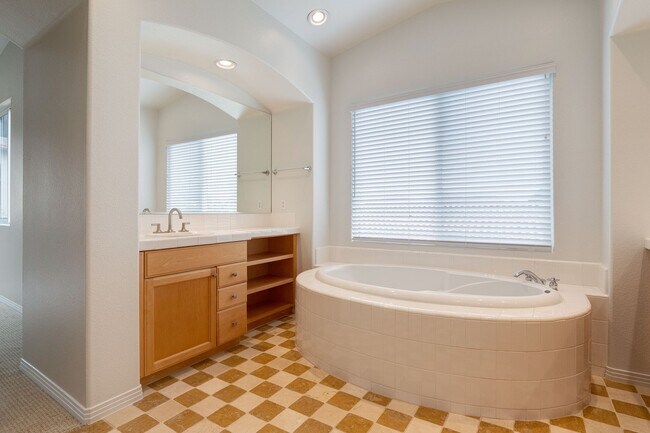 Building Photo - Gated corner lot home walking distance to the beach