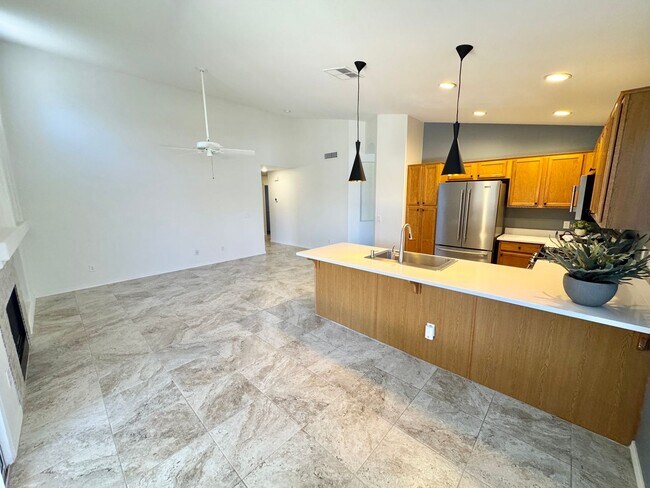 Building Photo - Meticulously Maintained 3 Bedroom + Den Single Level Home! Fantastic Low Backyard.
