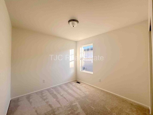 Building Photo - 6278 N Nepal Ct