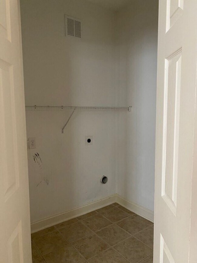 Building Photo - Magnolia Greens - Leland