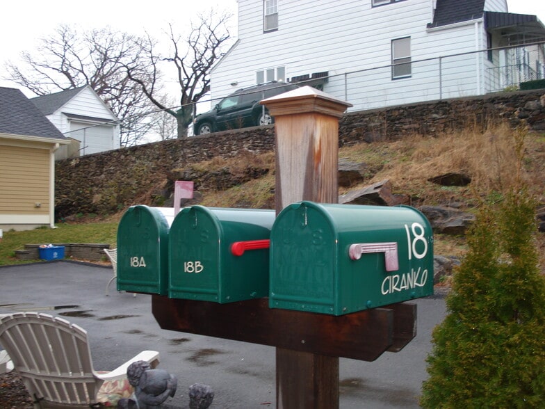 Mail boxes, parking beyond - 18 Berrian Pl