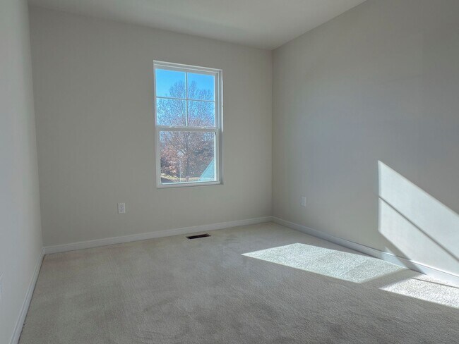 Building Photo - Modern New 3BR Townhome in Hancock Village with Luxury Finishes