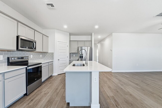 Building Photo - Modern 4-Bedroom Ranch-Style Corner Lot Home - *RENT SPECIAL*