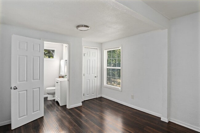 Building Photo - "Charming 2-Bedroom Duplex Retreat on Clou...