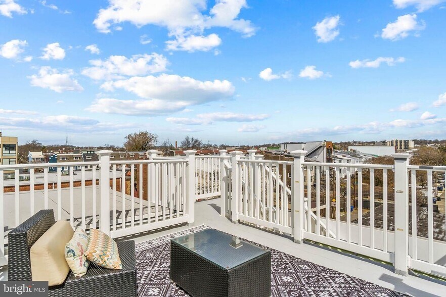 Semi-private roof deck with 270 degree views of Columbia Heights and Petworth. Shared with PH 9 - 3821 14th St NW