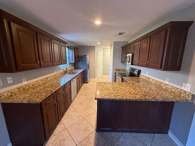 Building Photo - Gulf Breeze - Grand Ridge - 4 bedroom, 2.5...