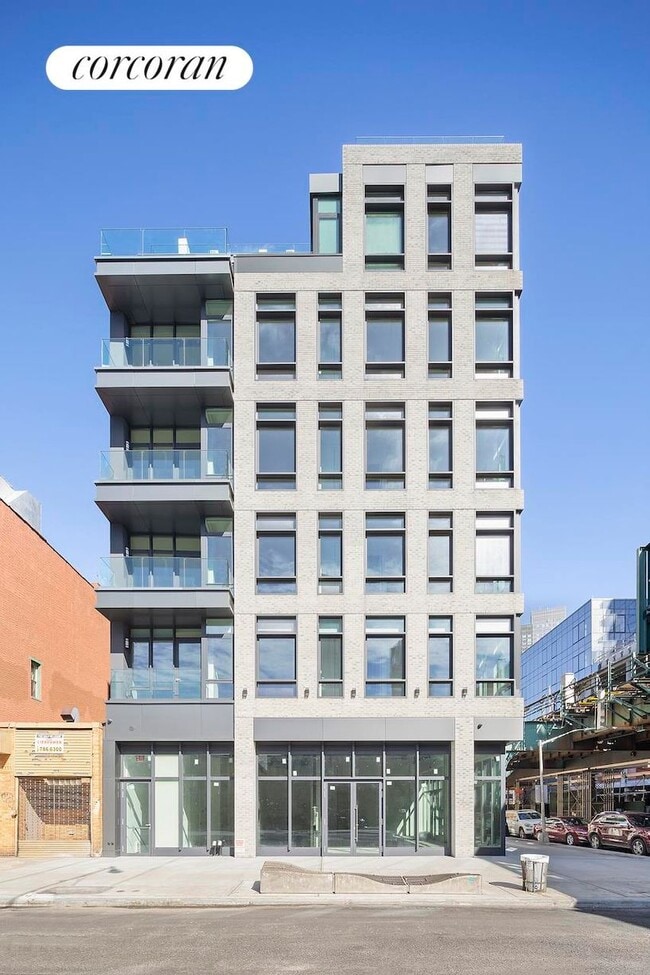 Building Photo - 21-59 44th Drive 2C