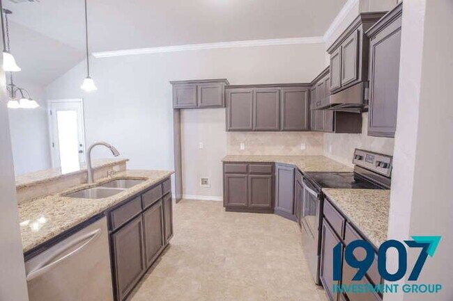 Building Photo - Spacious and modern home in the highly sou...