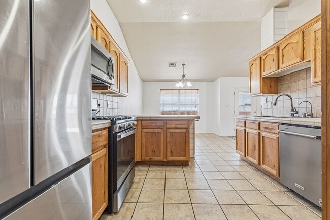 Building Photo - 4 Bedroom 2 Bath with Solar on a Large Corner Lot