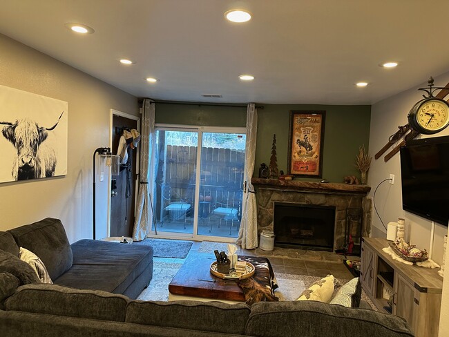 Living area and wood burning fireplace - 1890 Argentine St