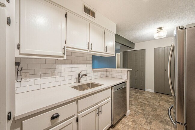 Building Photo - 7040 W 20th Ave