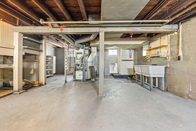 Building Photo - Classic Goodyear Heights Colonial — Hardwood, Arched Dining, Garage + Big Basement