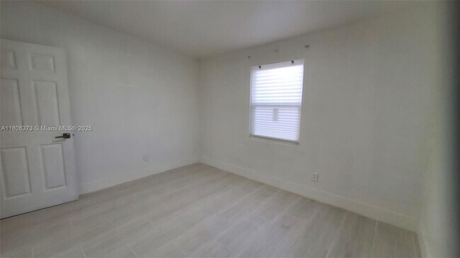 Building Photo - 841 NW 12th Ave