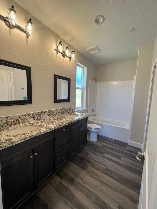Building Photo - "Modern & Energy-Efficient 3BR/2BA Home wi...