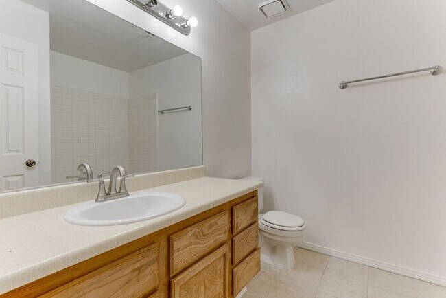 Building Photo - Charming 2 Bed, 2 Bath Condo with Fireplace & Balcony! 89011
