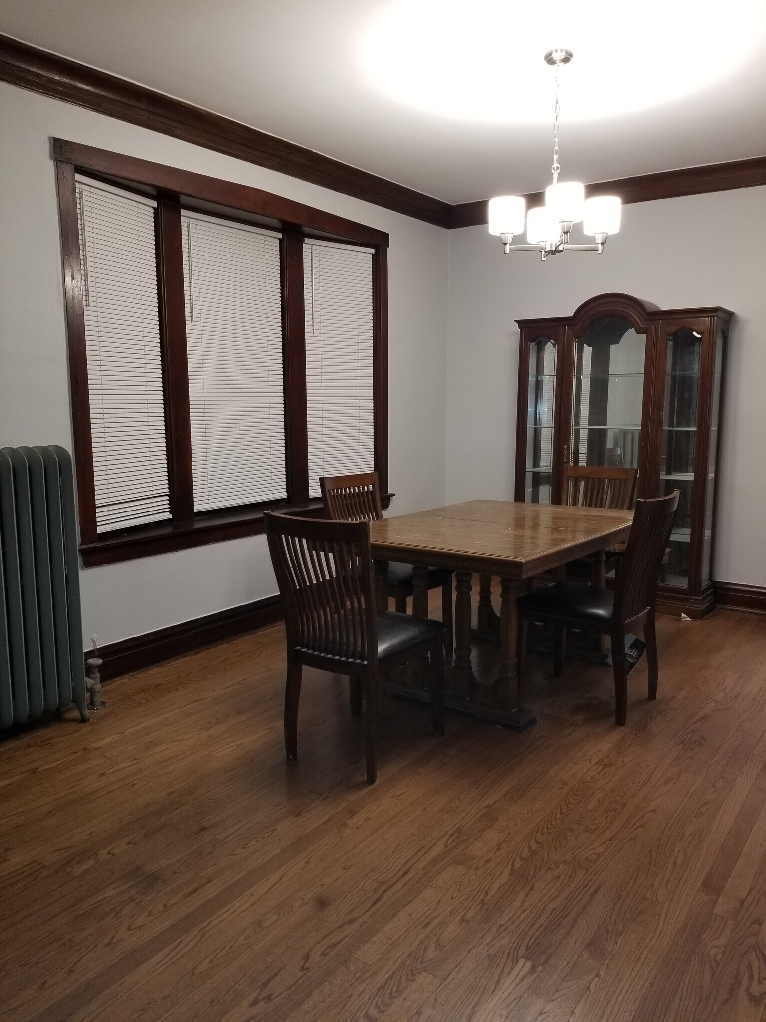 Comes with table, chair, and china cabinet in unit - 4939 W Cornelia Ave