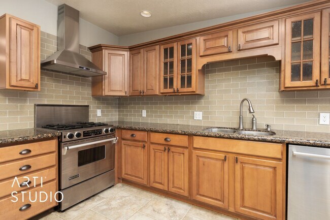 Building Photo - **Stunning 4-Bedroom Home with Modern Amen...