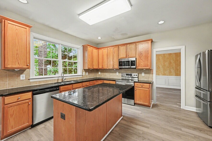 Building Photo - 1203 Fairfax Woods Dr