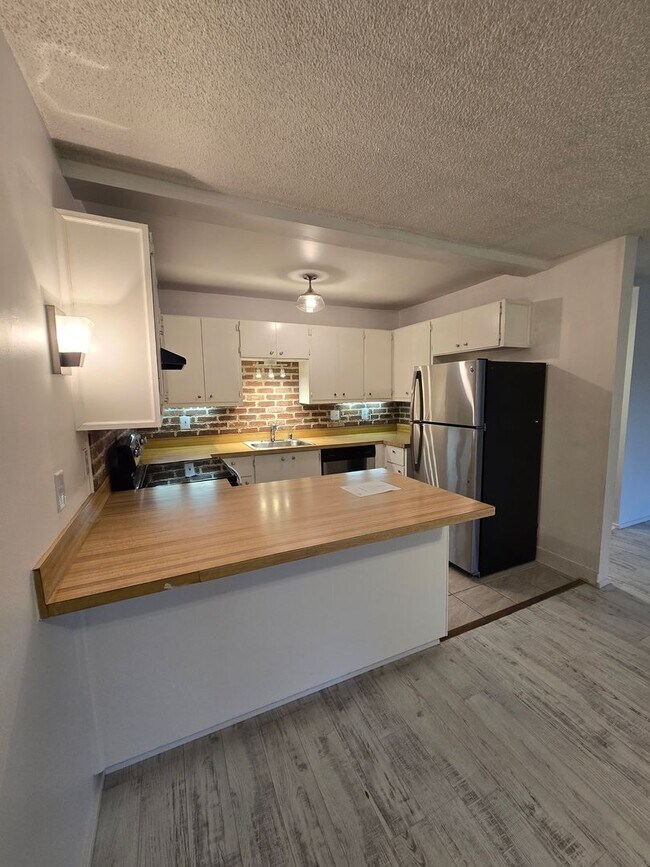 Primary Photo - $500 move in credit. Easy Living Starts He...