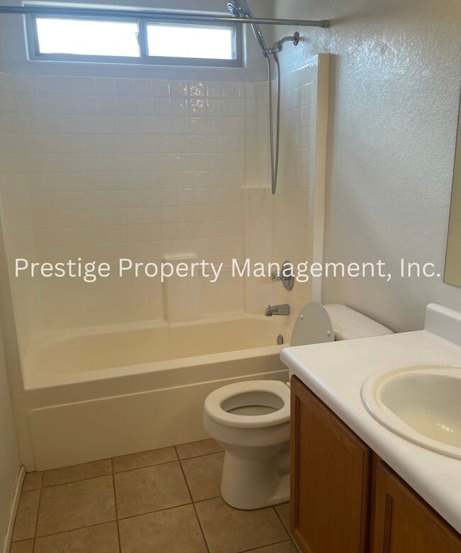 Building Photo - Charming All Tile 4/2 Rita Ranch Home